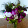 Cymbidium orchid and real touch calla lily bouquet, peacock feathers