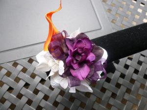 Wrist corsage, plum and orange wrist corsage, Baltimore themed wrist corsage, purple and orange corsage, calla lily delphinium corsage - Image 3