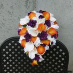 Orange and plum cascading bridal bouquet