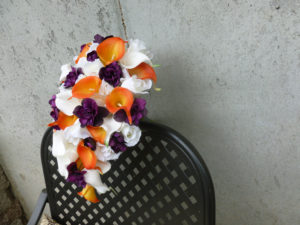 Orange and plum cascading bridal bouquet - Image 3