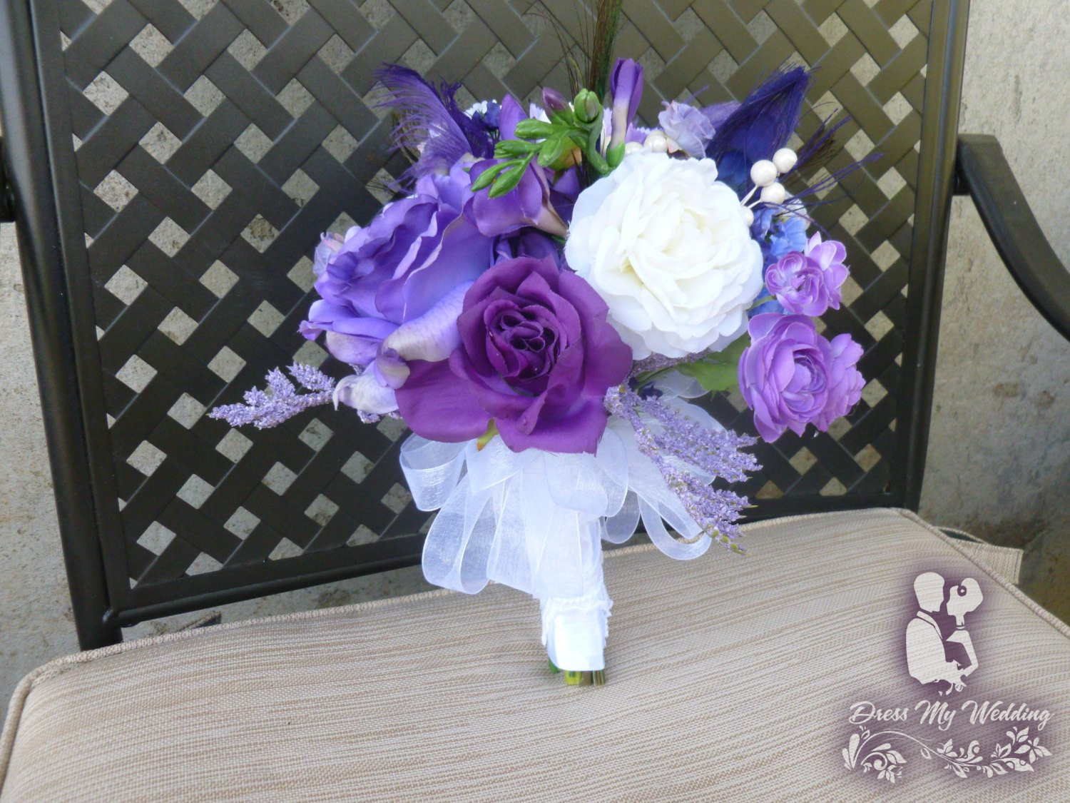 Wedding Bouquet with White Roses and Feather Accents