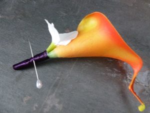 Orange and white calla lily hydrangea boutonnière