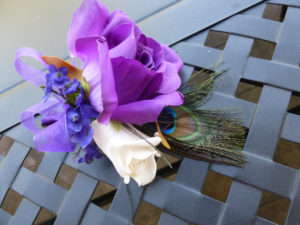 Purple and white rose corsage, artificial rose corsage with peacock feather accsent