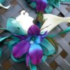 Wrist corsage Galaxy orchid, rose, calla lily, peacock feathers