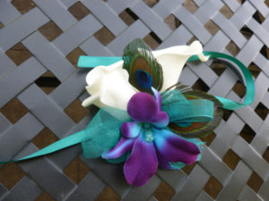 Wrist corsage Galaxy orchid, rose, calla lily, peacock feathers - Image 2
