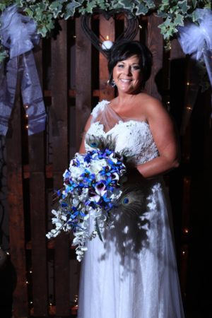 Cascading Purple blue dendrobium orchid bouquet peacock feathers - Image 4