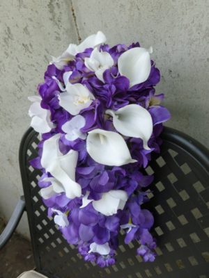Cascading purple and white bridal bouquet