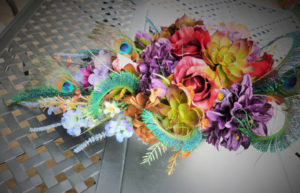 Vintage, antique looking cascading bouquet with peacock feathersautumn, rustic, cascade bridal bouquet, peacock feathers