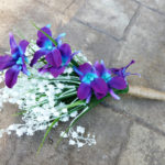 Galaxy orchid, lilies of the valley, rustic country bouquet