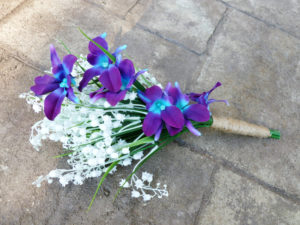 Galaxy orchid, lilies of the valley, rustic country bouquet