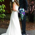 Cascading teal and purple bridal bouquet