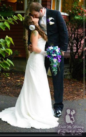 Cascading teal and purple bridal bouquet
