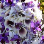Cascading bridal bouquet with purple, plum, lavender