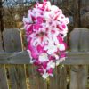 Pink fuchsia orchid and tiger lily cascading bouquet
