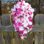 Pink fuchsia orchid and tiger lily cascading bouquet