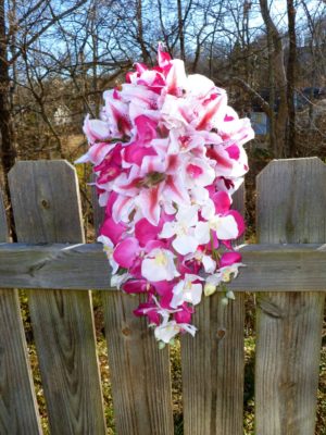 Pink fuchsia orchid and tiger lily cascading bouquet