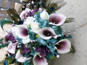 Teal plum cascading bouquet with picasso calla lilies, blue, purple hydrangea bouquet, teardrop bouquet, peacok feathers, pearls - Image 4