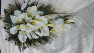 Calla lily & rose cascade bouquet with feathers, 50s style