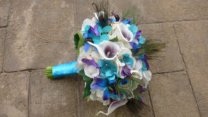 Ivory, turquoise and plum bouquet with peacock feathers - Image 3