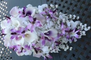 White and purple cascading bouquet