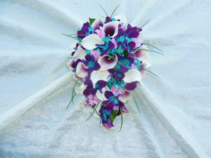 Galaxy orchid bouquet with cherry blossoms