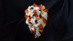 Orange and plum cascading bridal bouquet