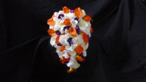 Orange and plum cascading bridal bouquet - Image 5