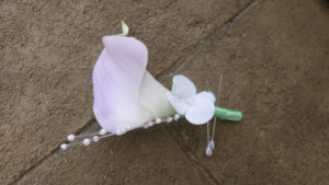 Lavender calla lily pearl boutonniere