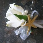 Rose corsage, boutonniere with starfish