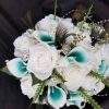 Cascading teal and white peacock bouquet - Image 5
