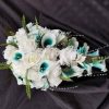 Cascading teal and white peacock bouquet