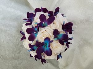 Red rose and galaxy orchid bridal bouquet - Image 3