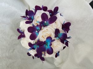 Red rose and galaxy orchid bridal bouquet - Image 6