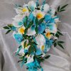 Cascading turquoise orchid, calla and plumeria beach wedding bouquet - Image 3
