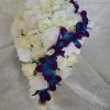 Cascading rose bouquet with orchid accent