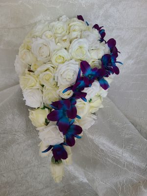 Cascading rose bouquet with orchid accent