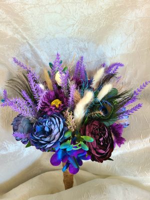 Peony, thistle, orchid, and daisy bouquet