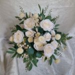 Ivory peonies, roses, eucalyptus bridal bouquet